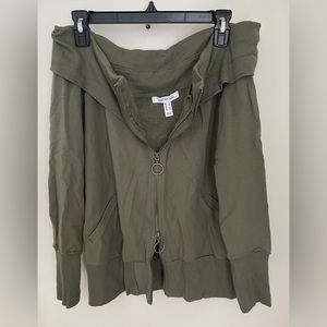 Off the shoulder olive green jacket.
